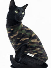 Load image into Gallery viewer, Black cat wearing stylecom.nz green designer camouflage fleece top on a white background