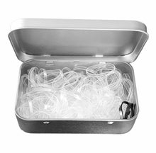 Load image into Gallery viewer, Small silver tin of x100 clear polyband hair ties to reduce friction and breakage. Available at Stylecom.nz 