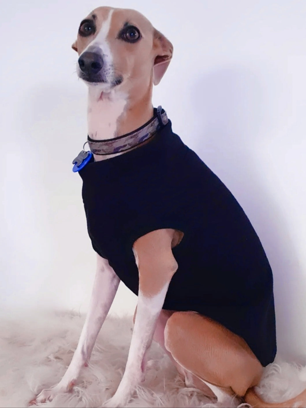 Stylecom.nz black fleece sleeveless, wide neck dog top. Approx 44cm in length. Can also be worn underneath coats or harnesses for added warmth.